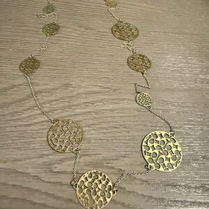Elegant Gold Coach Pendant Necklace